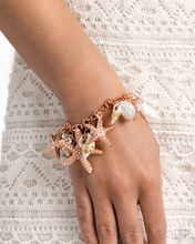 Load image into Gallery viewer, Paparazzi Seashell Shanty - Copper Necklace &amp;  Paparazzi Seashell Song - Copper Bracelet Set

