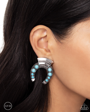 Load image into Gallery viewer, Paparazzi Harmonious Horseshoe - Blue Earrings (Clip On)
